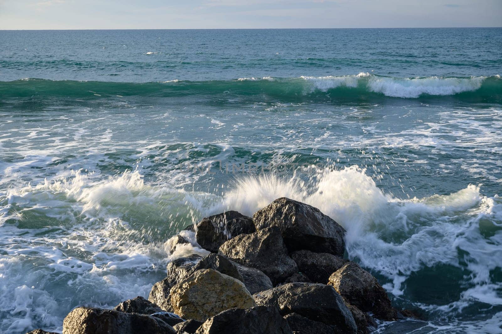 waves stones in the sea on the Mediterranean in winter 12