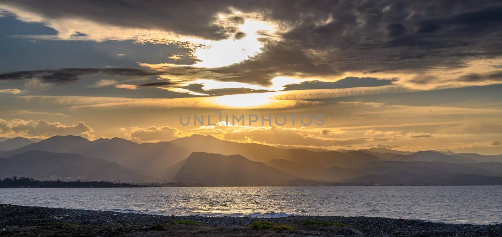 evening sun over mountains and Mediterranean sea 32