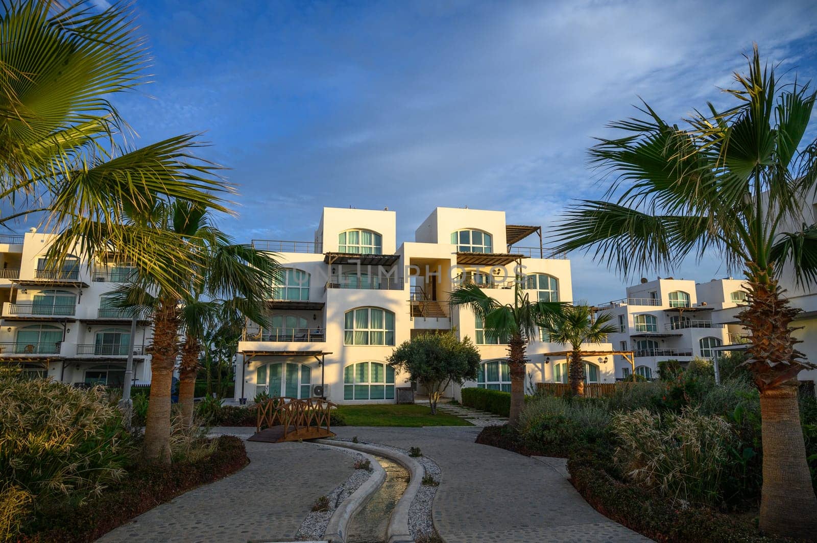 complex with white villas on the Mediterranean Sea