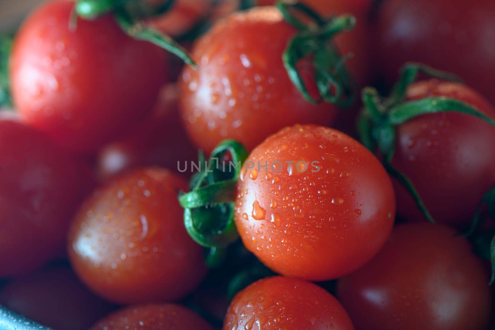 red fresh cherry tomatoes as food background 1