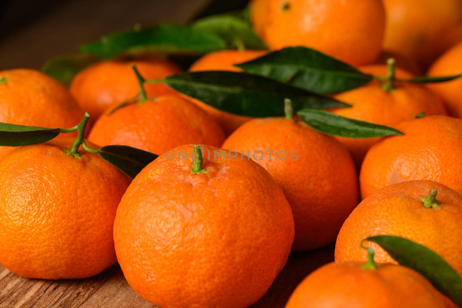 fresh juicy tangerines on the table 1 by Mixa74