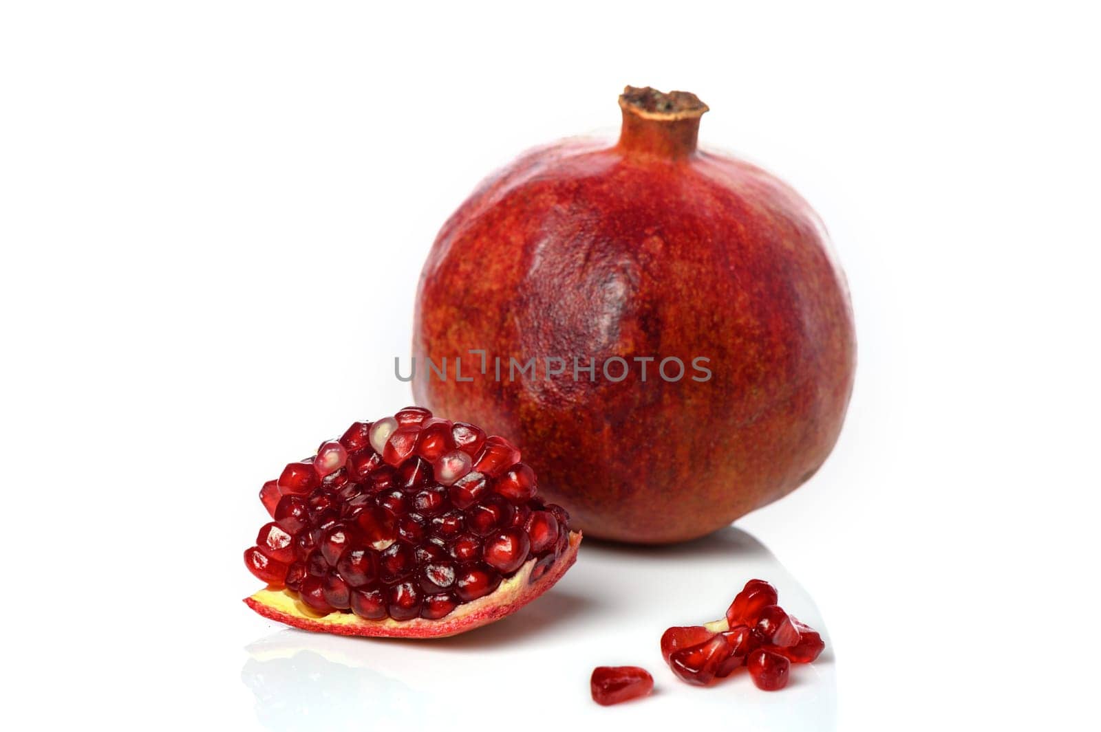 pomegranate and pomegranate slice on a white background 2 by Mixa74