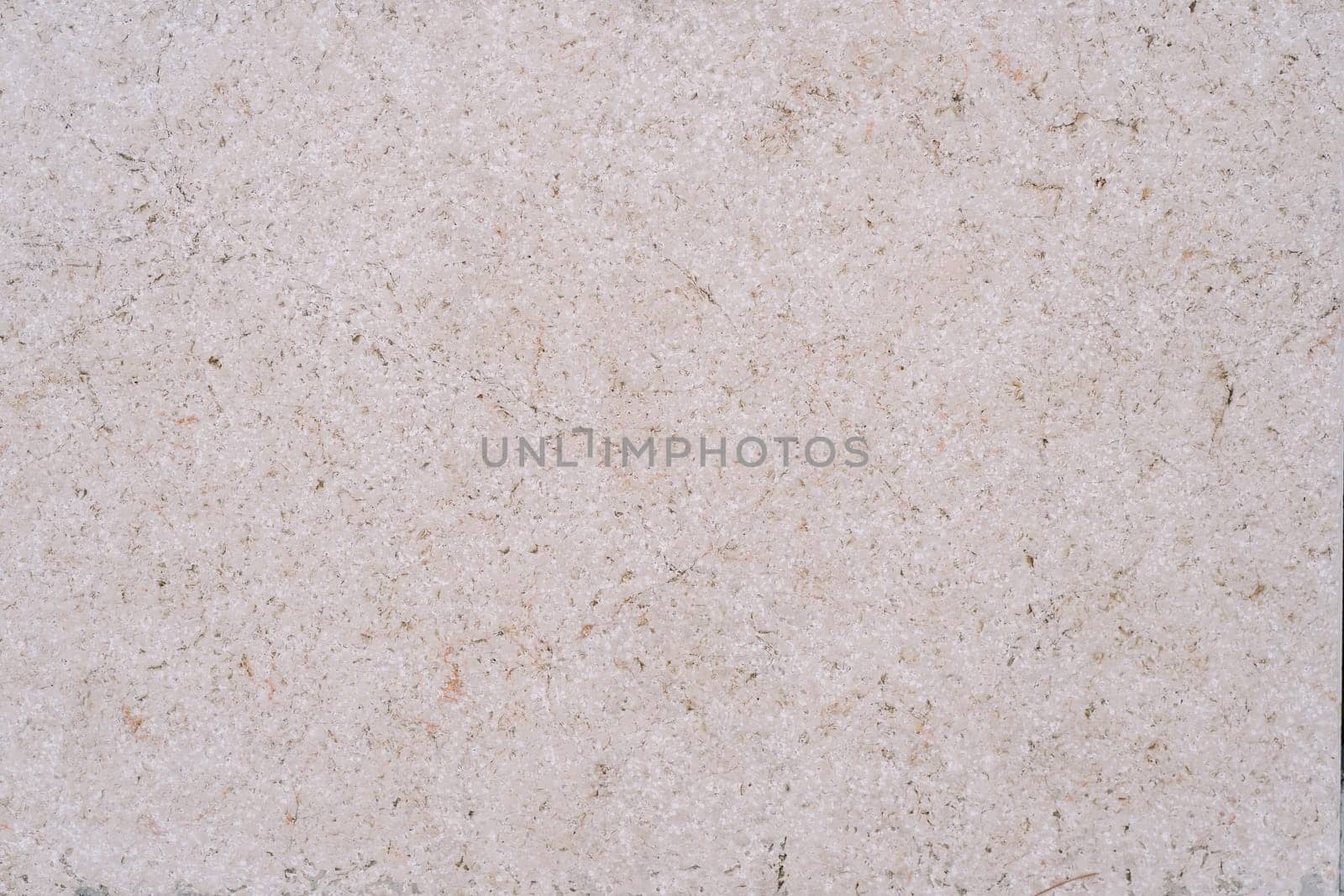 Stone texture with brown spots, scratches and cracks. High quality photo