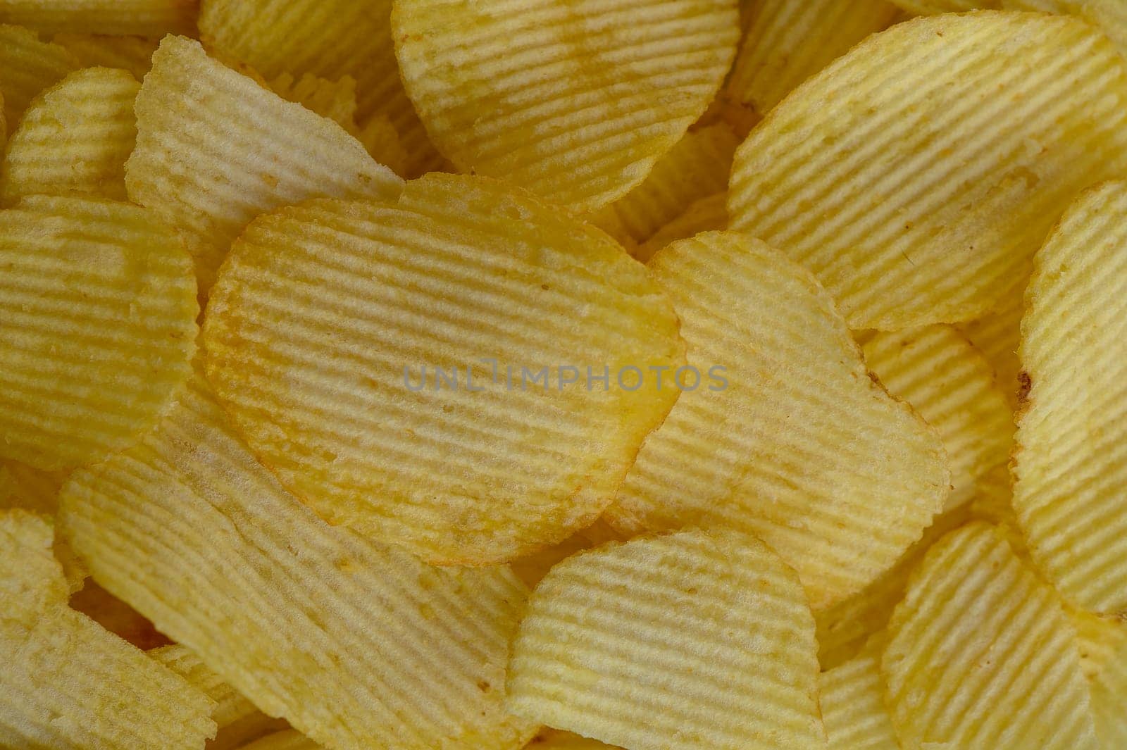 food background, delicious potato chips laid out on the table 1 by Mixa74