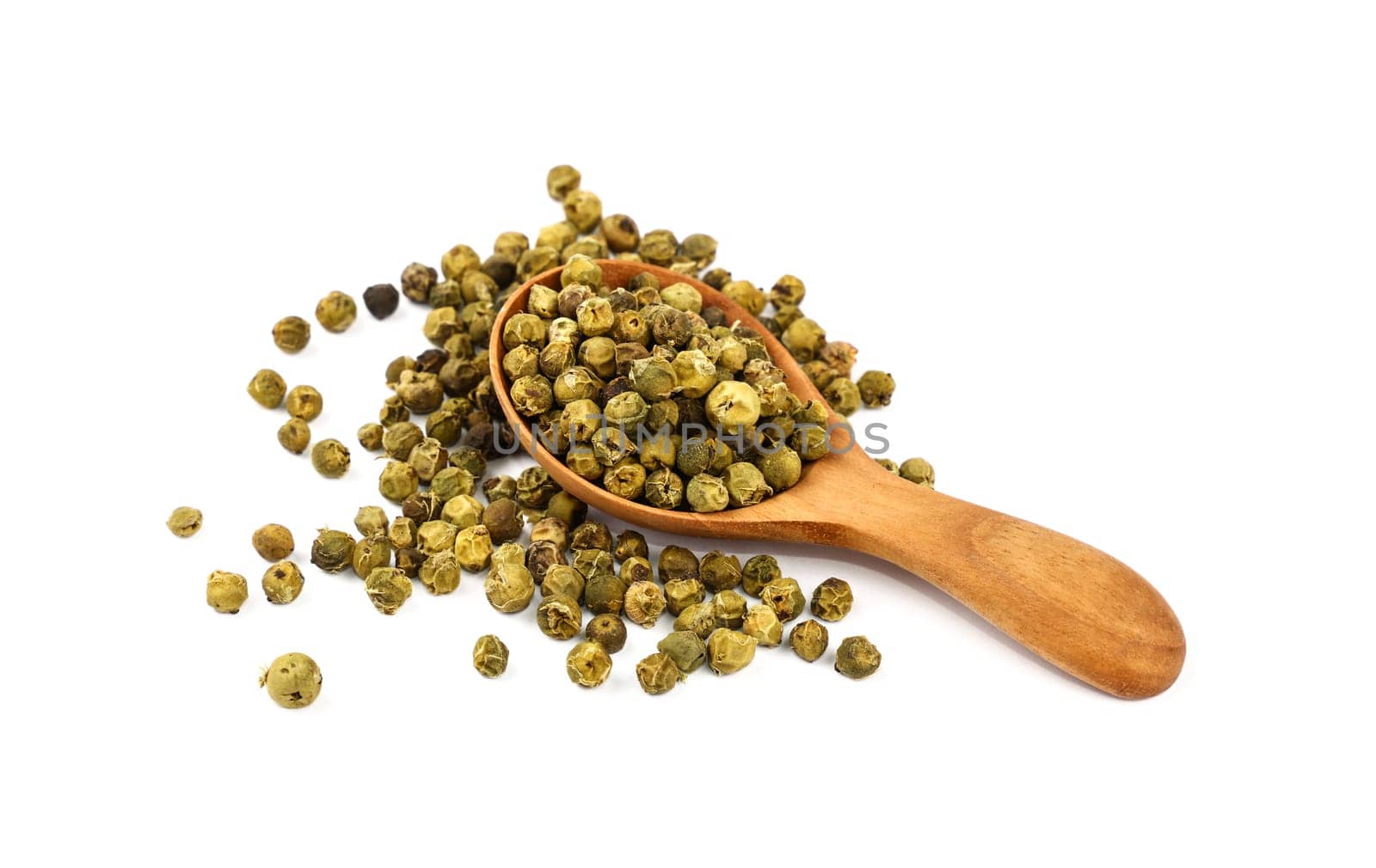 Close up one wooden scoop spoon full of green pepper peppercorns and heap of peppercorns spilled and spread around isolated on white background, high angle view