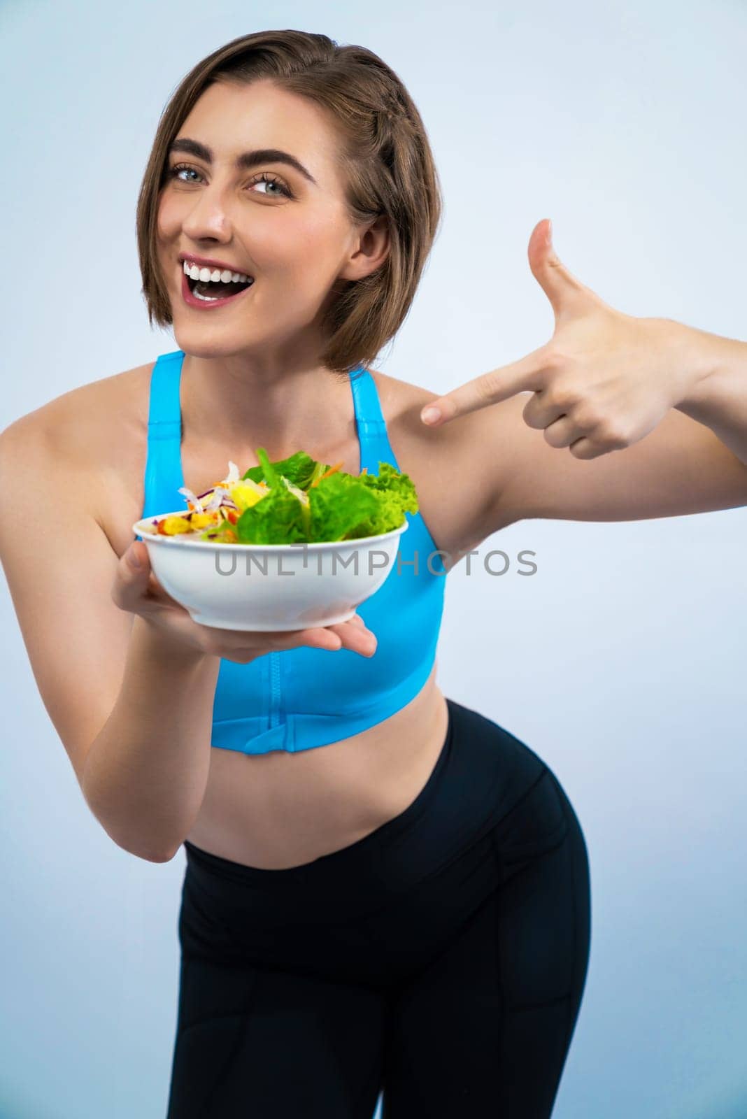 Full body length gaiety shot athletic and sporty young woman with healthy vegan by biancoblue