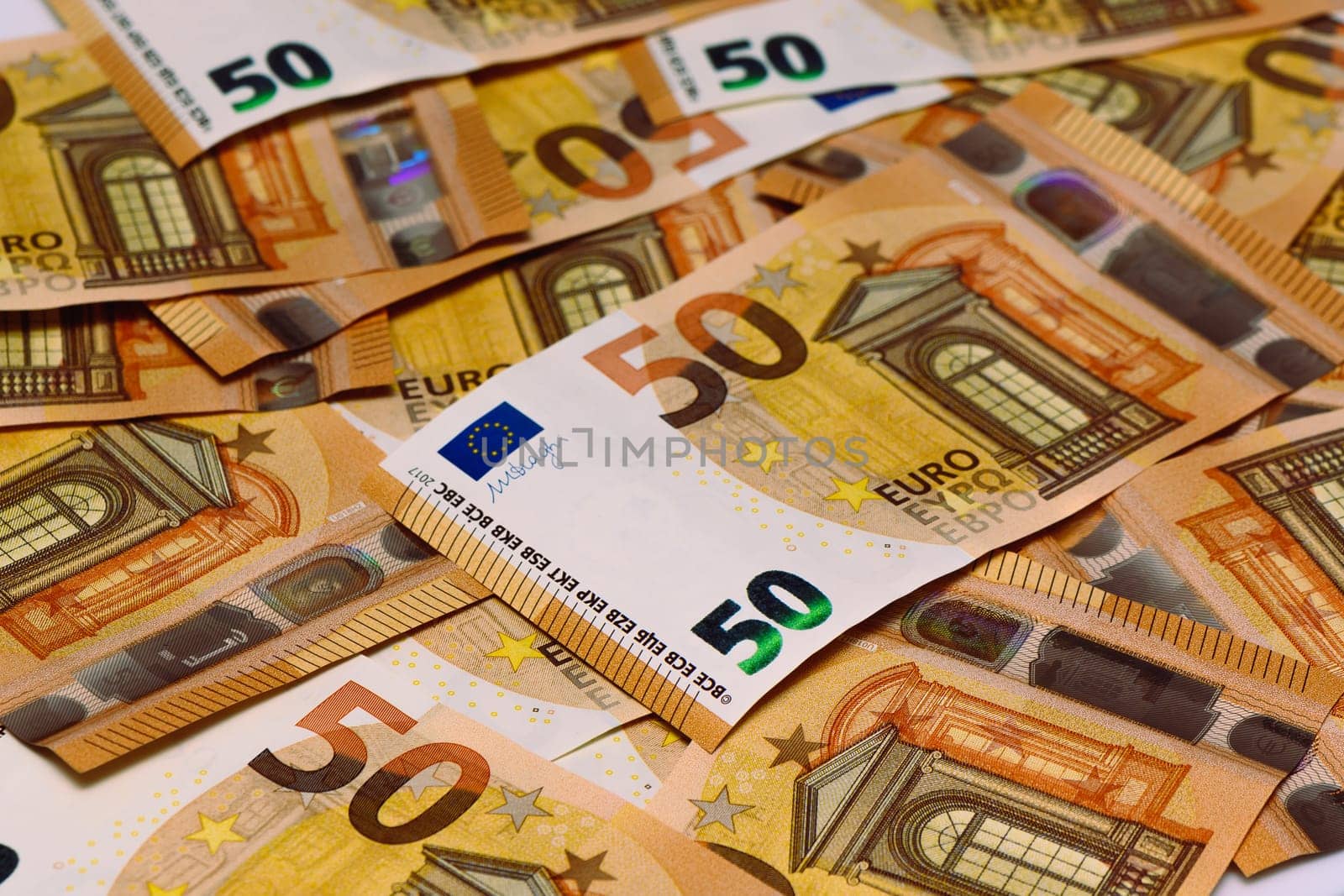 50 euro bills scattered on the table as a background 17 by Mixa74