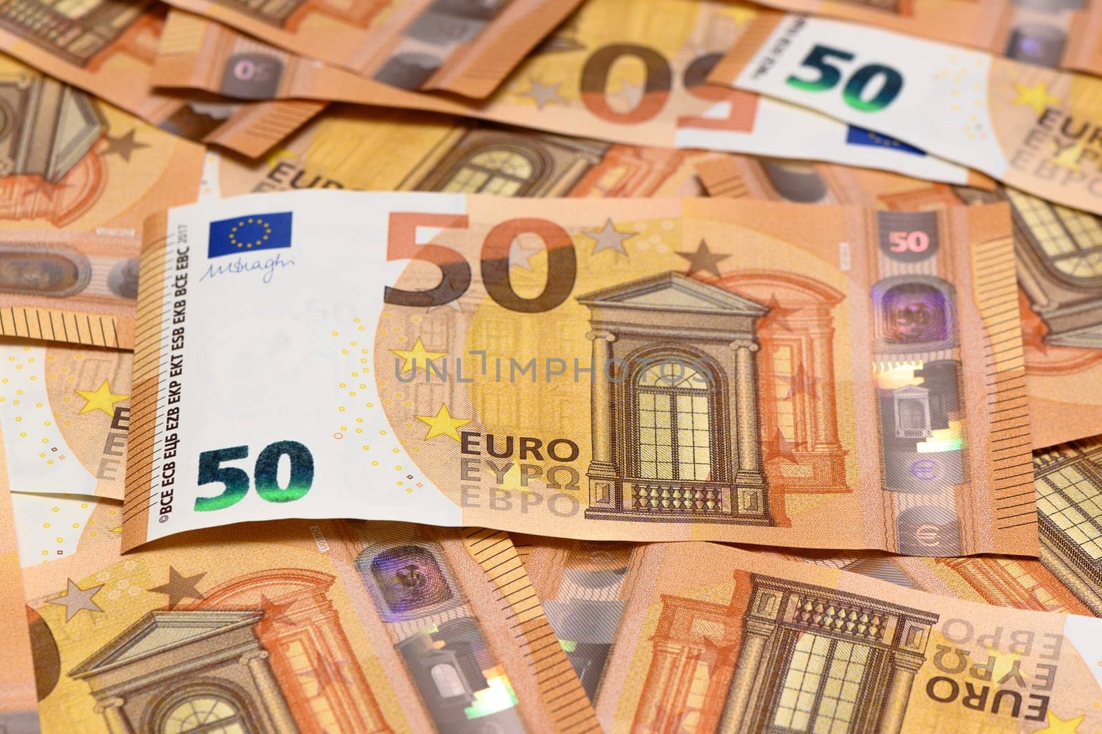 50 euro bills scattered on the table as a background 18 by Mixa74