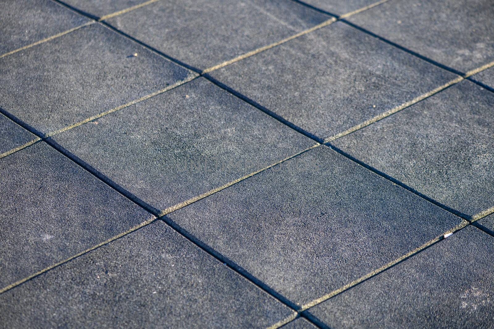 rubber soft covering with squares on the playground 9