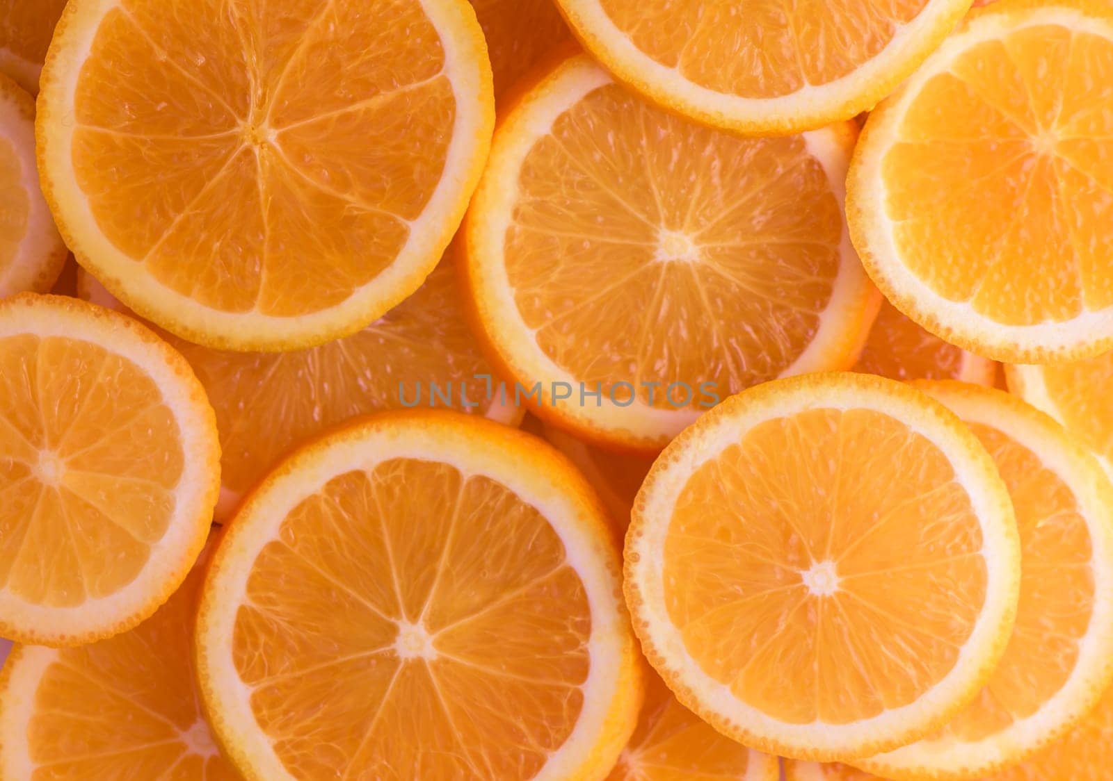 oranges cut into slices and laid out on the table as a food background 8