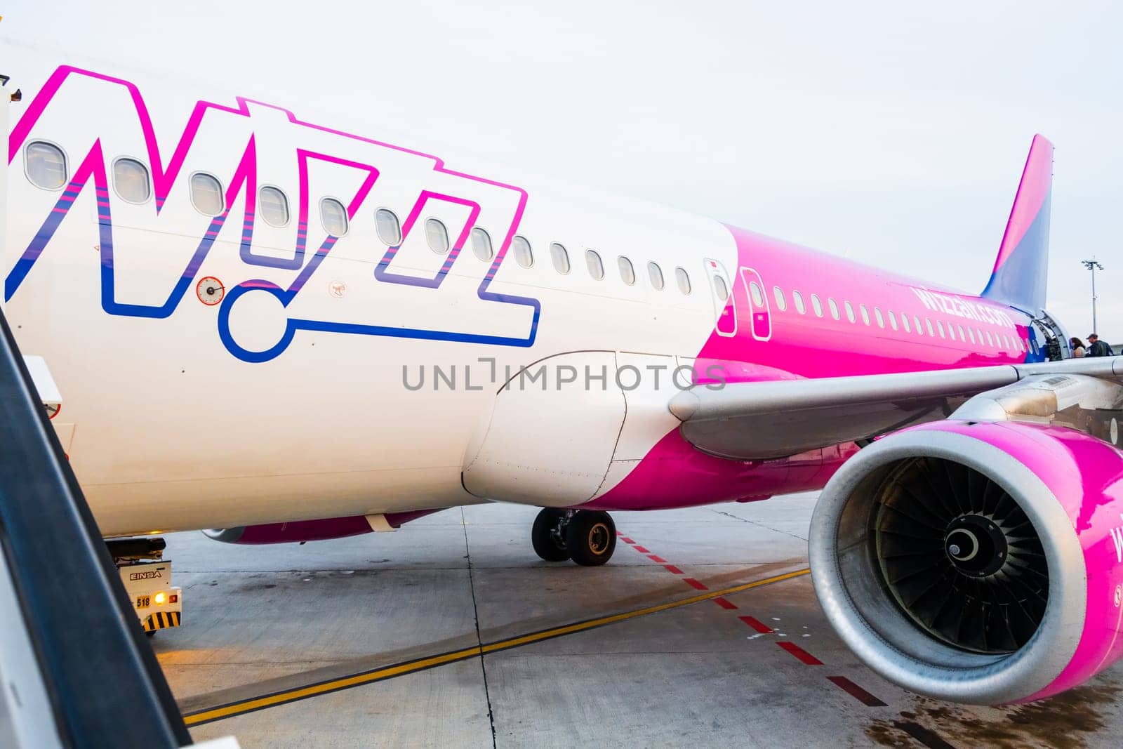 The Wizzair aircraft is prepared for passenger boarding. by vladimka