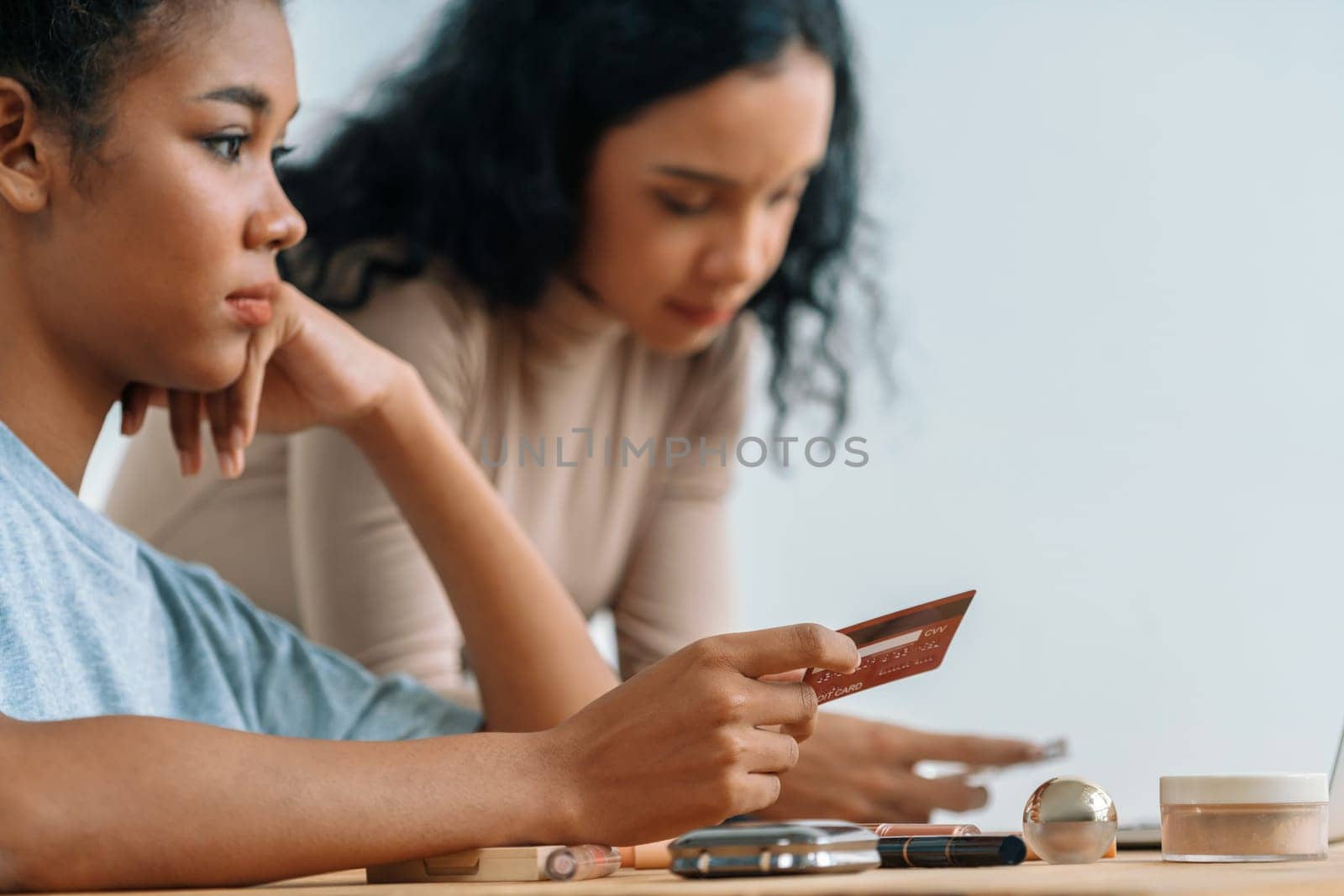 Stressed African women has financial problems credit card debt to pay crucial by biancoblue