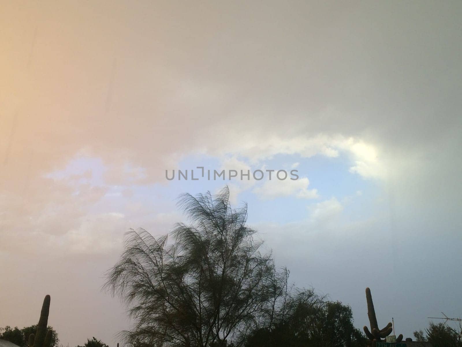 Blue Hole in Clouds, Afternoon Storm, Dramatic Sky in Arizona . High quality photo