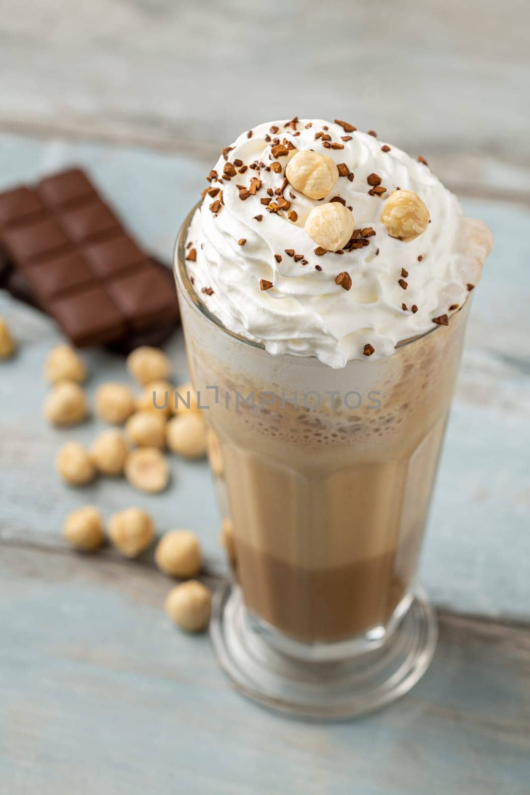 hazelnut and chocolate milkshake with coffee sprinkled on top by Sonat