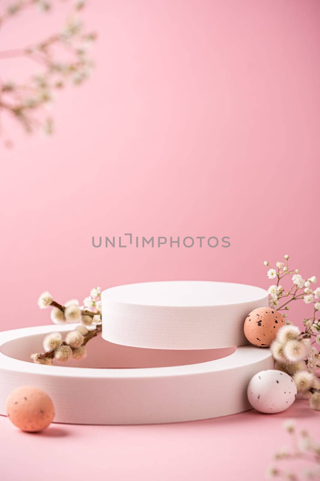White podium with Easter quail eggs by IrynaMelnyk