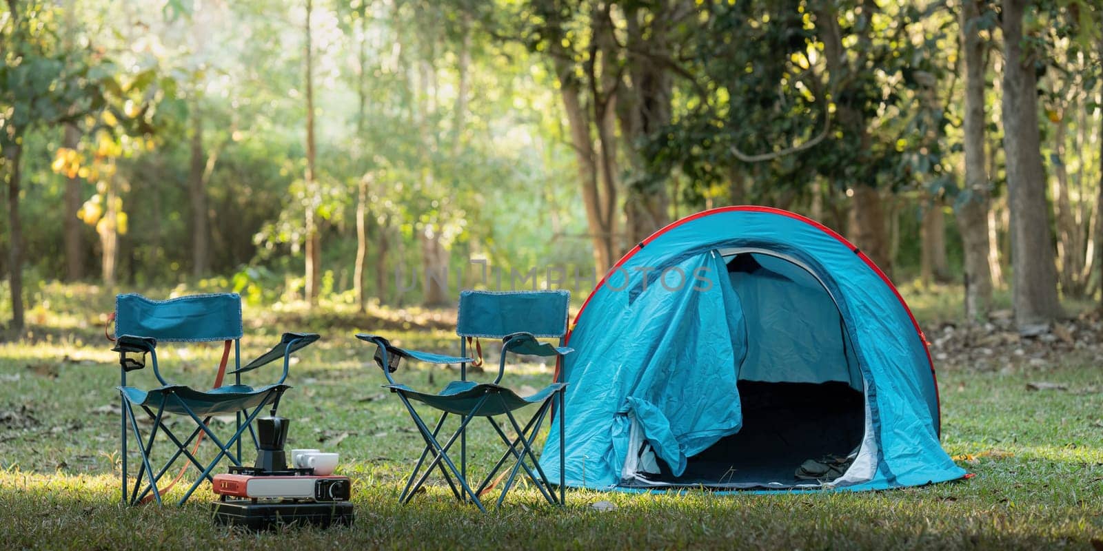 Outdoor activity concept camping are with tent and equipment for camping by nateemee