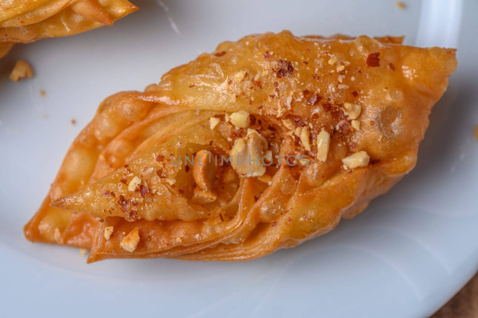 Turkish baklava, sweet dessert with honey on a light plate 13 by Mixa74