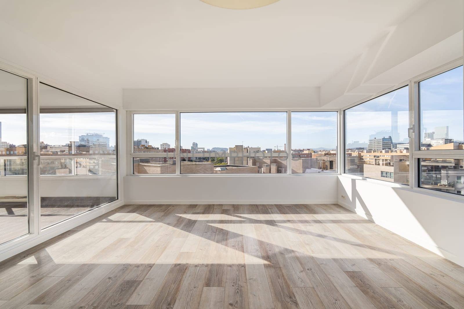 Luxury studio apartment with panoramic views in Spain. Bright room in large apartment with sunny side lack of furniture. Awesome apartment for family