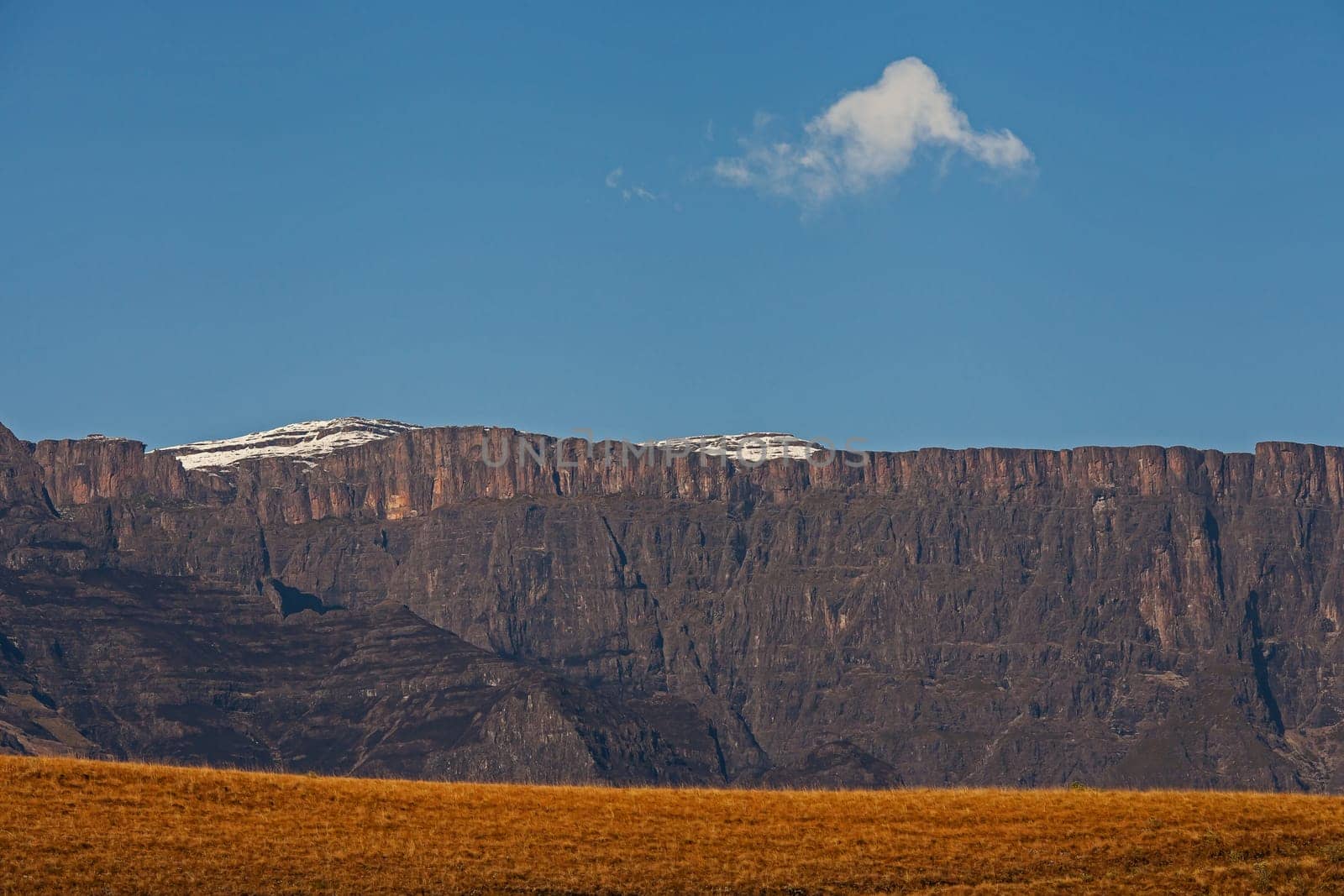 The Amphitheater formation with a light dusting of snow seen from the Royal Natal National Park in the Drakensberg South Africa