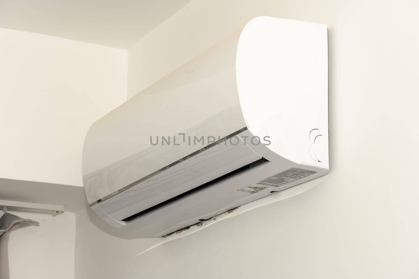 indoor air conditioner unit on a white wall 1 by Mixa74
