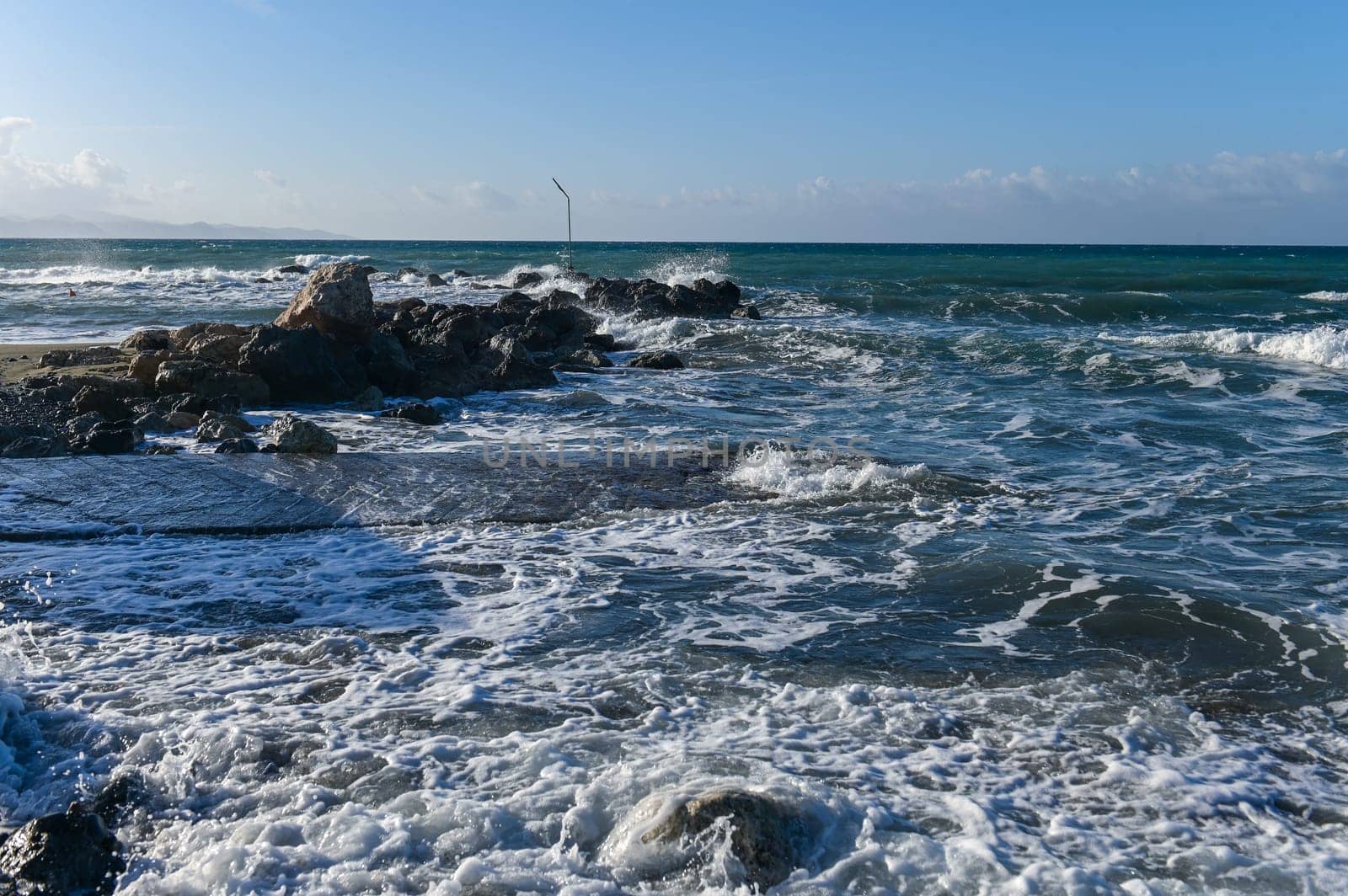 coast beach waves shore of the Mediterranean sea in winter in Cyprus
