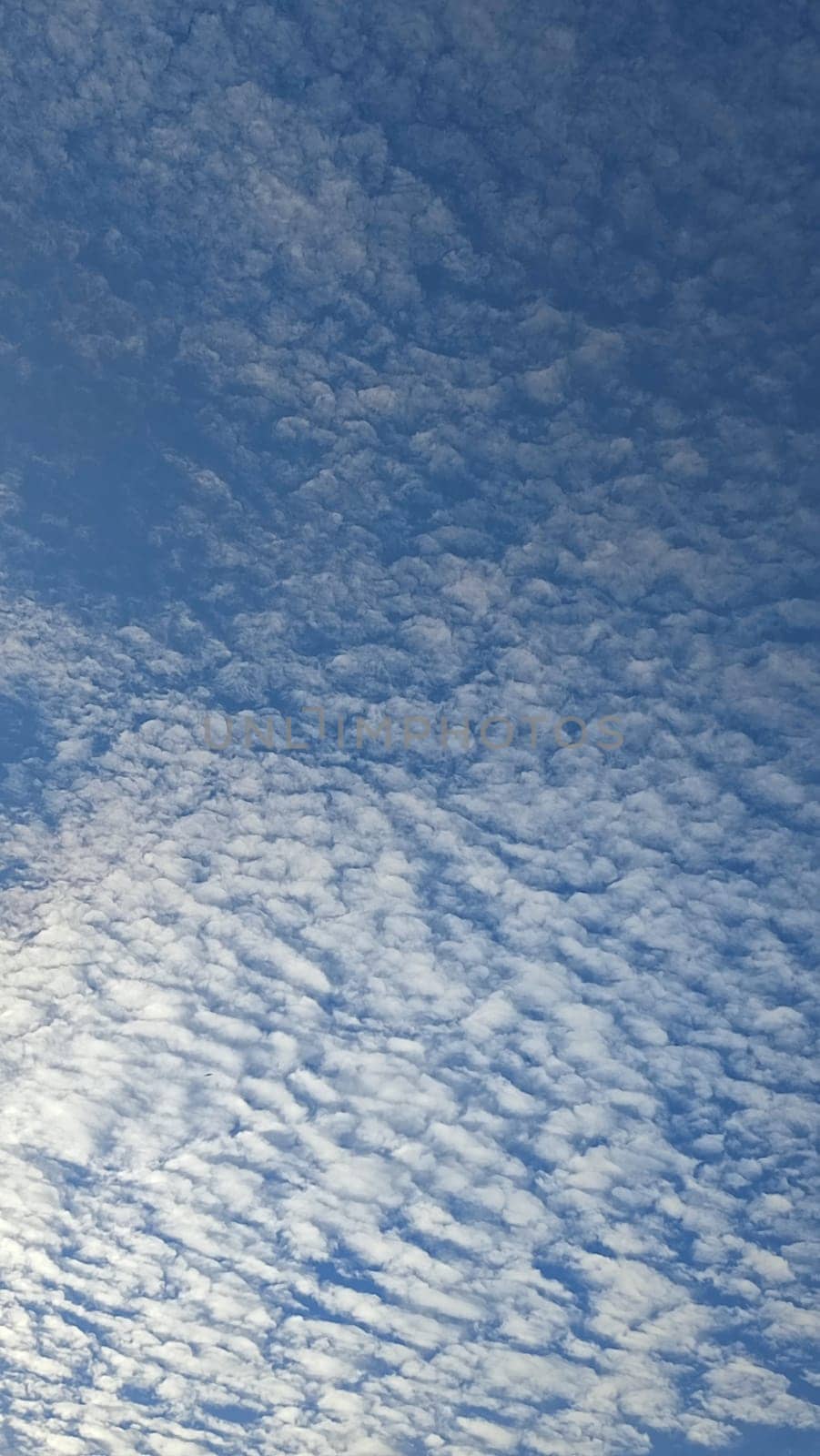 Blue light sky nature white clouds whether background . High quality photo