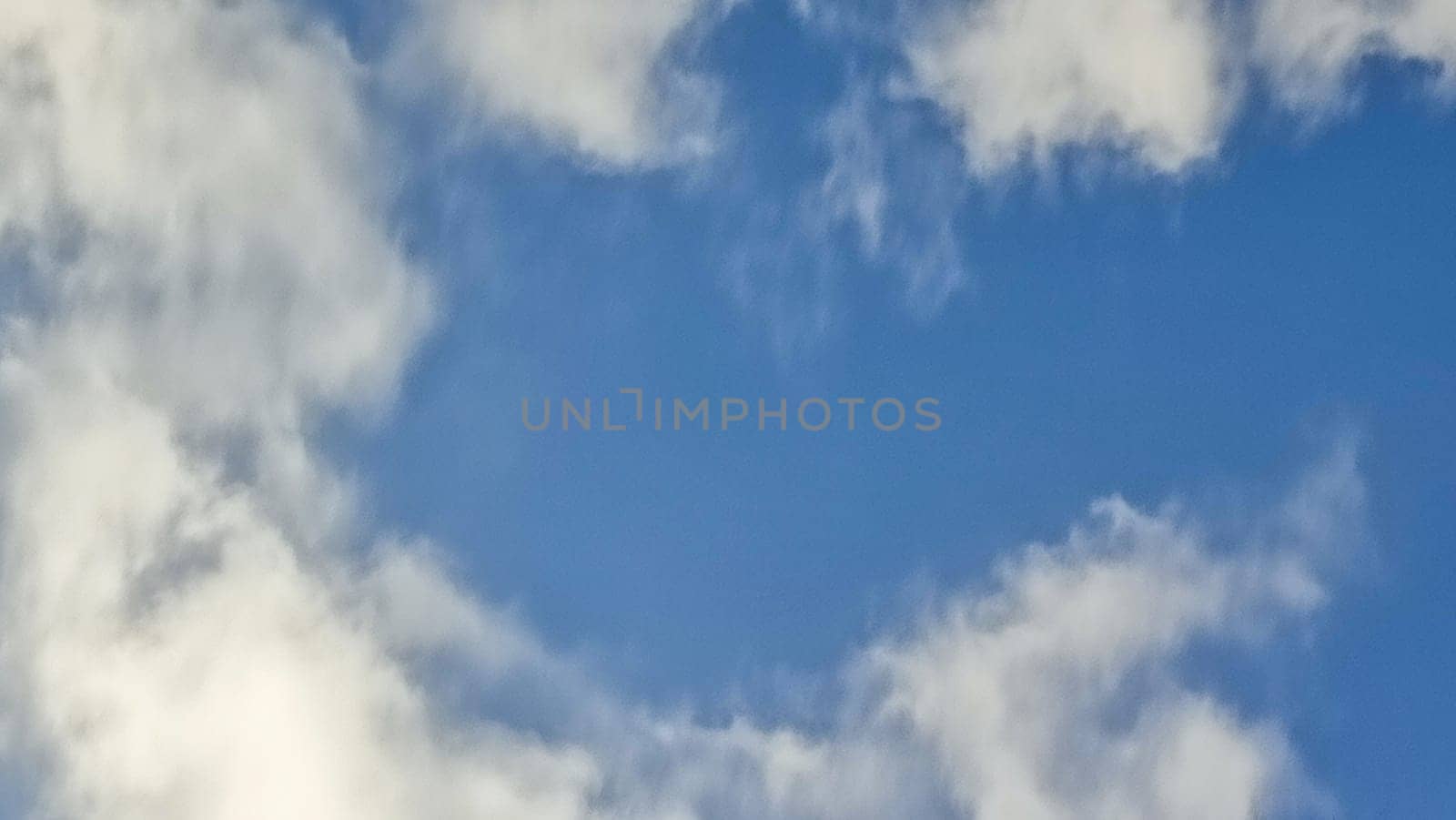 Blue light sky nature white clouds whether background . High quality photo