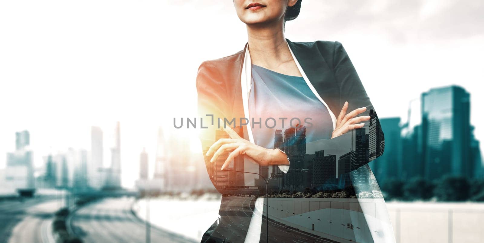 Double Exposure Image of Business Person on modern city background. Future business and communication technology concept. Surreal futuristic cityscape and abstract multiple exposure interface. uds