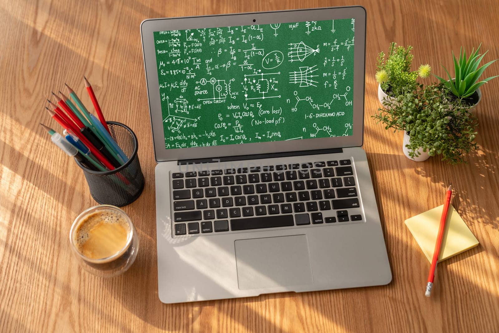 Mathematic equations and modish formula on computer screen showing concept of science and education