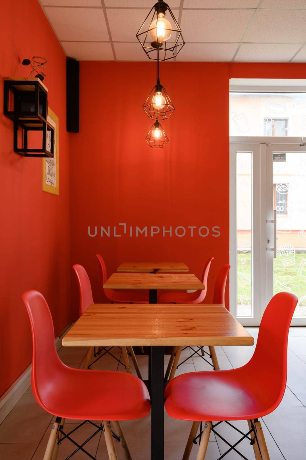 Ivano-Frankivsk, Ukraine March 26, 2023: Interior of a fast food establishment or cafe, red interior in a cafe.