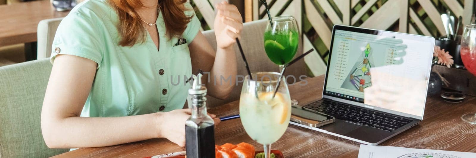 Tver, Russia-august 7, 2022. A woman with a laptop is studying human design. The concept of studying esoteric sciences. Studying rave postcards from human design by Annu1tochka