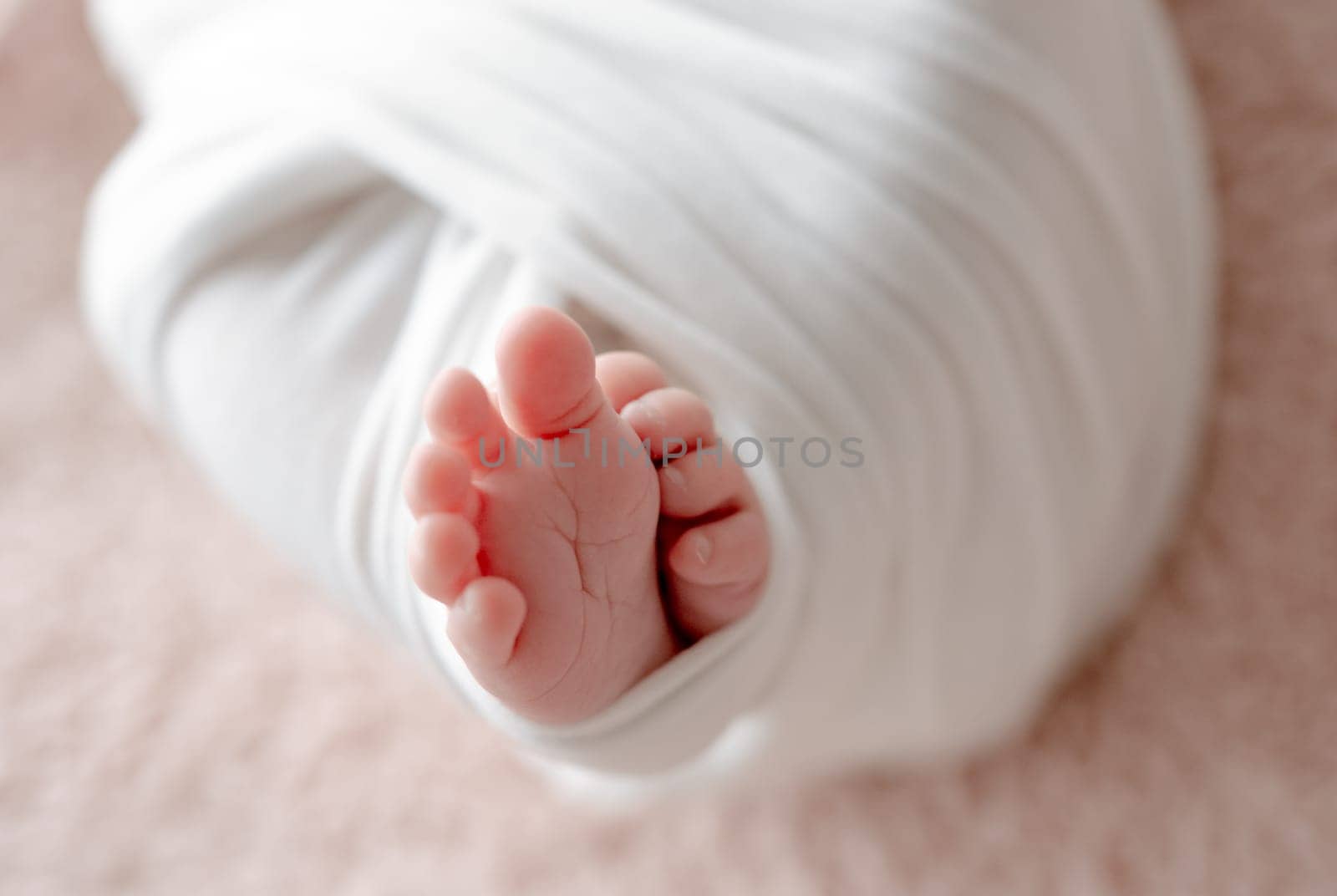 Close-Up Of Newborn'S Legs by tan4ikk1