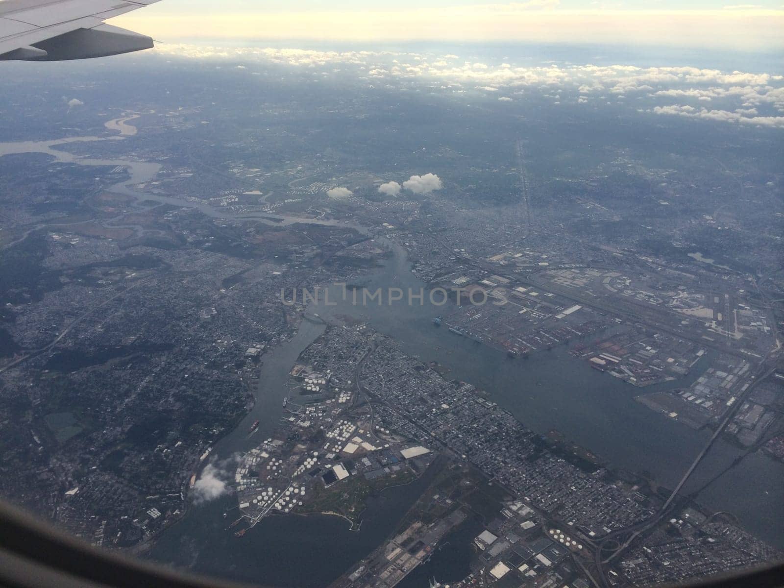 View from Airplane Window flying into New York City . High quality photo