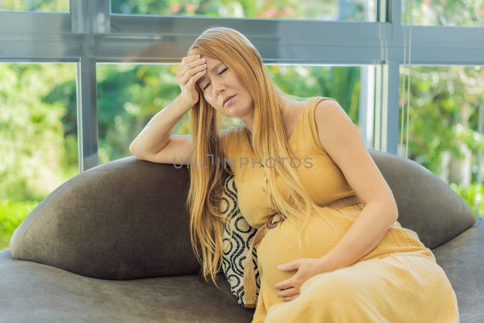 Expectant woman experiences discomfort, feeling unwell during pregnancy by galitskaya