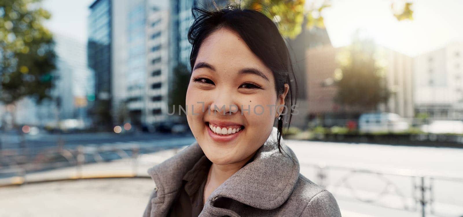 Business, city and portrait of Japanese happy woman for morning commute, travel and walking. Professional, corporate and worker with ambition, pride and confident for career, work and job in Tokyo.