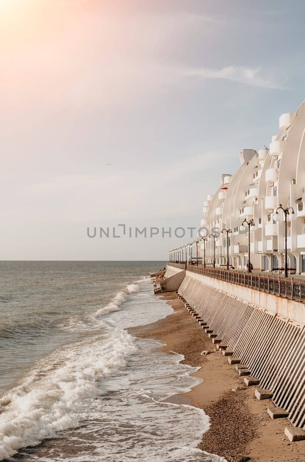 coastal area with apartment buildings of residential areas, modern hotel and restaurant complex on water and sandy beaches