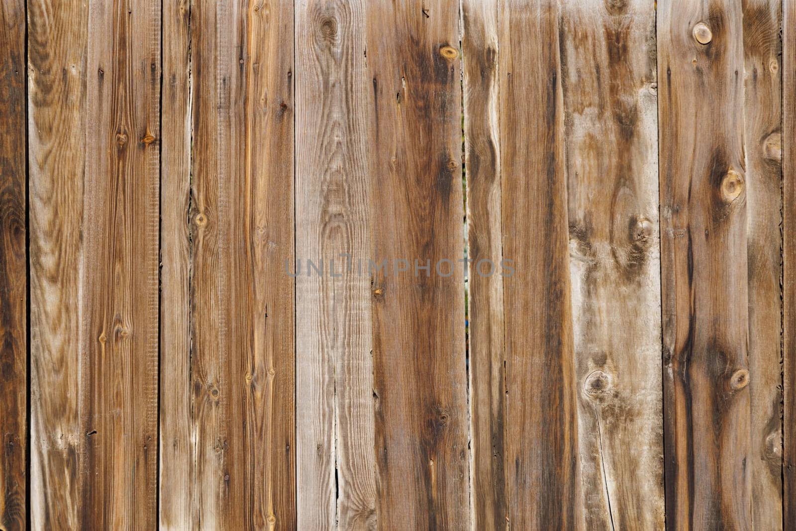 old dry weathered brownish gray wooden planks board surface - full frame background and texture by z1b