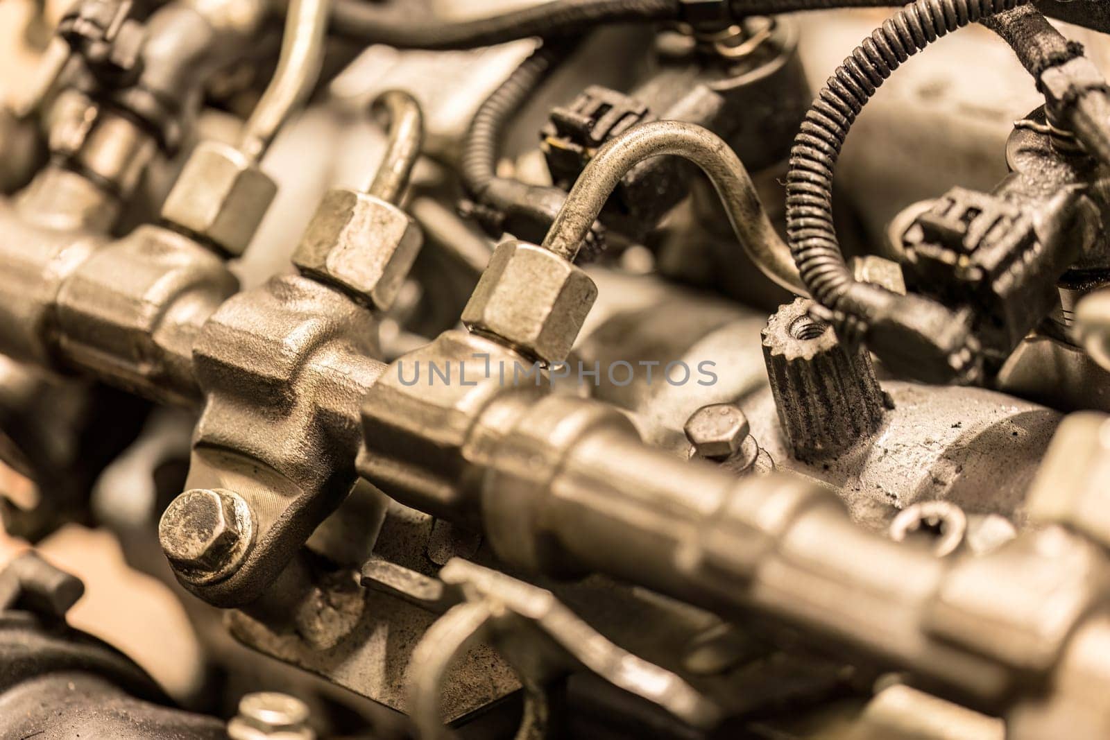 Rome, Italy 17 january 2024: Close-up photo of common rail diesel injectors, highlighting the intricate components of fuel injection.