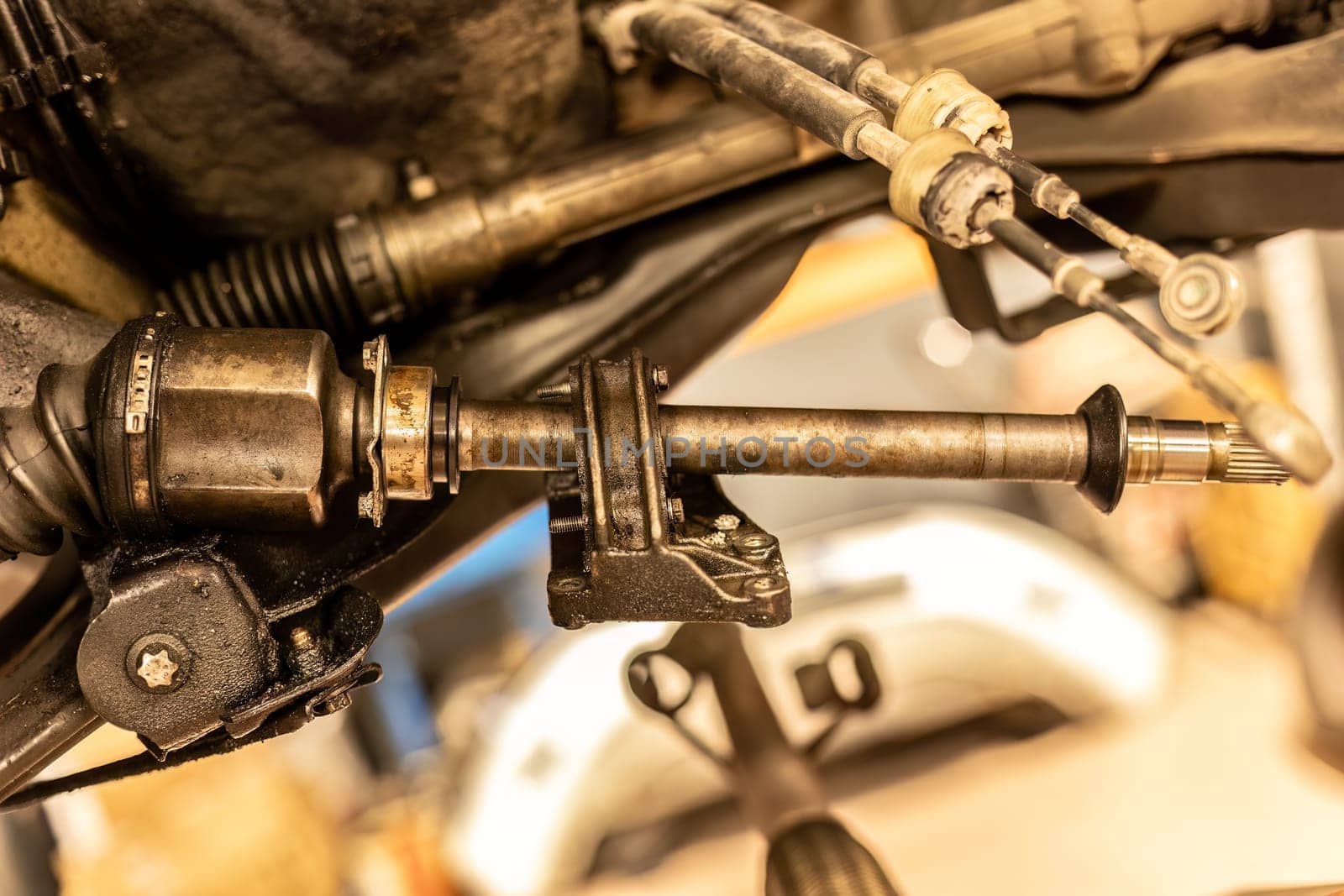 Photo of dismantled car axles, highlighting the complex inner workings of automotive mechanics.