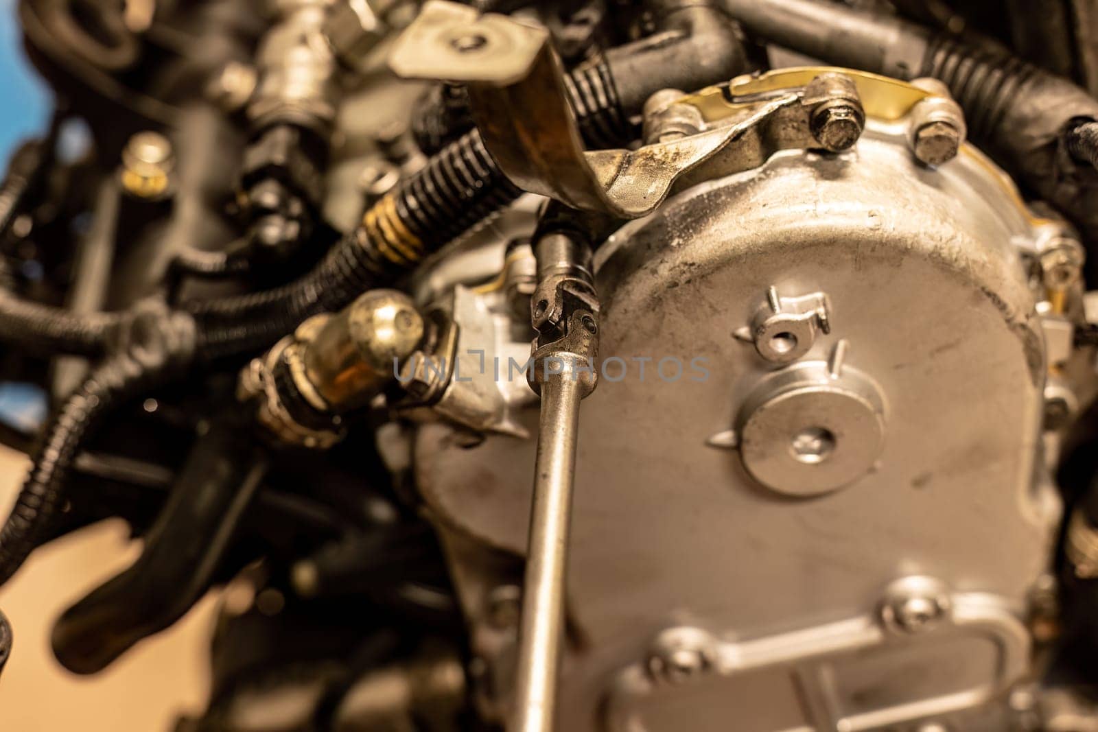 Photo of a flex-head wrench in action, skillfully tightening a screw, a staple in precision mechanical work.