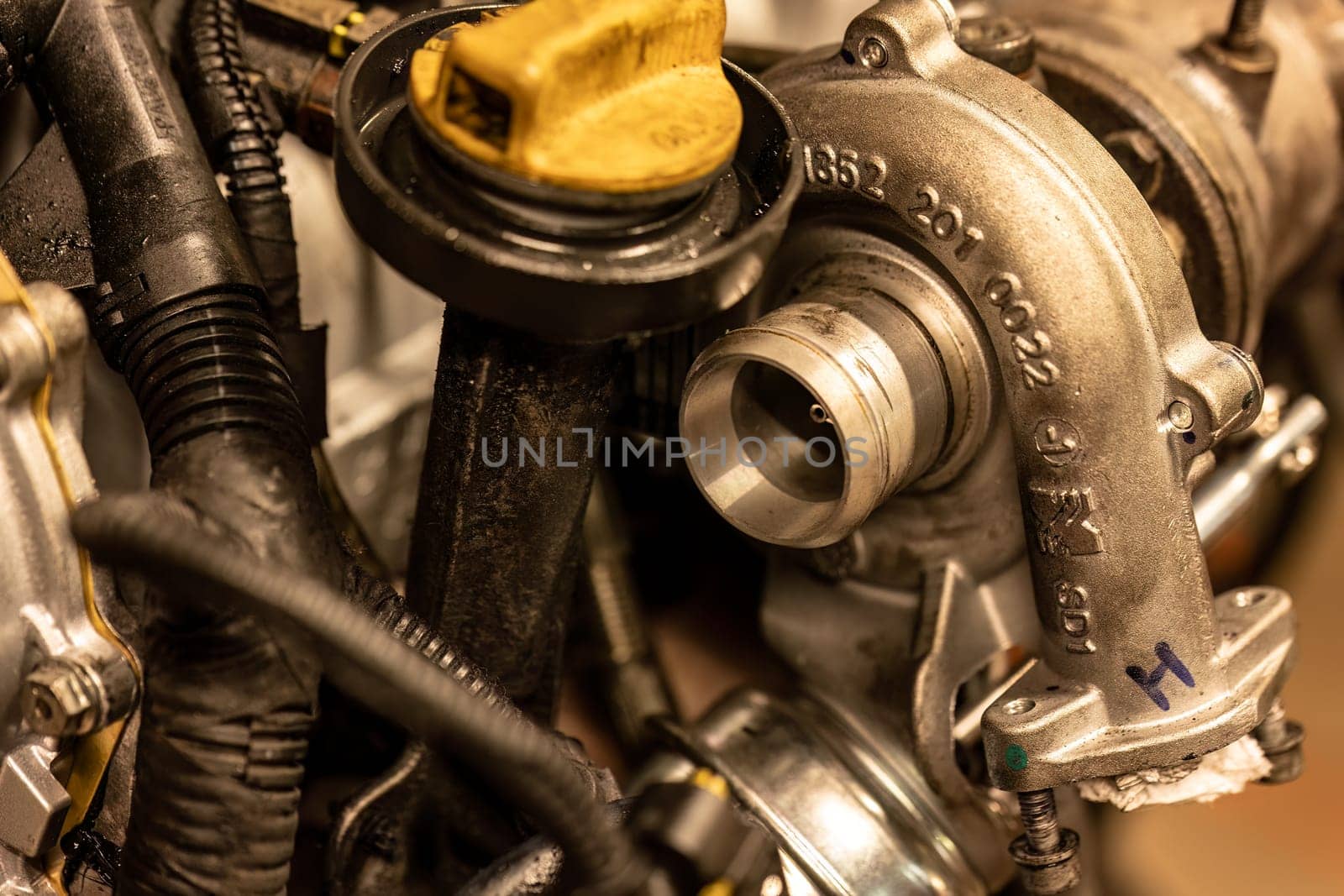 Rome, Italy 17 january 2024: Detailed photo of a diesel engine's turbine, emphasizing the concept of specialized diesel pump repair.