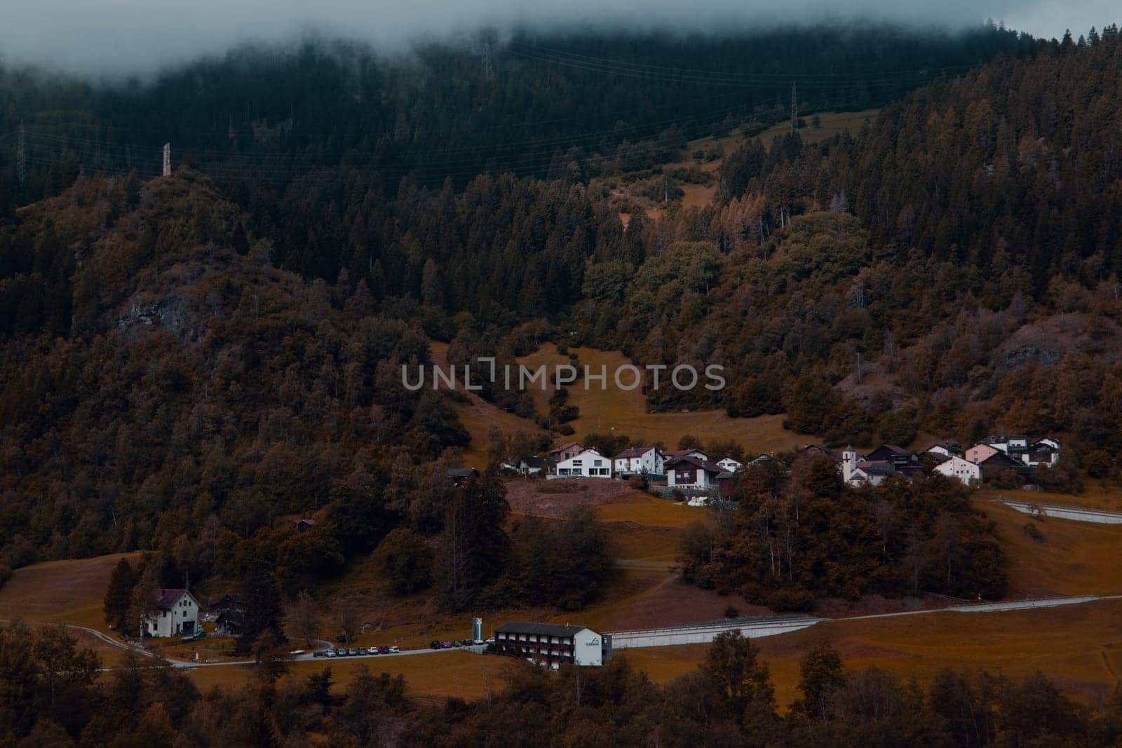 Secluded Mountain Village A Cozy Hamlet Nestled Amongst the Golden Hues of Fall. High quality photo