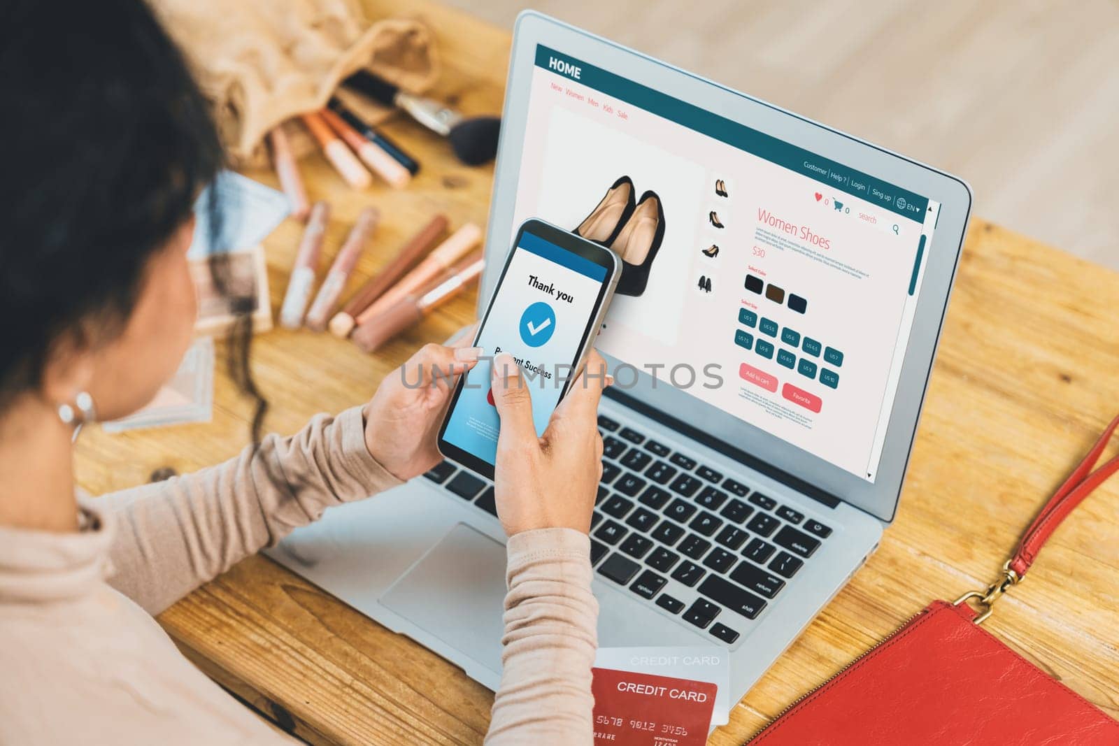 Woman shopping online on internet marketplace browsing for sale items for modern lifestyle and use credit card for online payment from wallet protected by crucial cyber security software