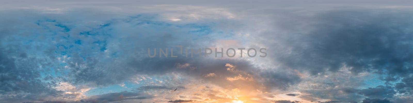 Bright sunset sky panorama with Cirrus clouds. Seamless hdr spherical equirectangular 360 panorama. Sky dome or zenith for 3D visualization, game and sky replacement for aerial drone 360 panoramas.