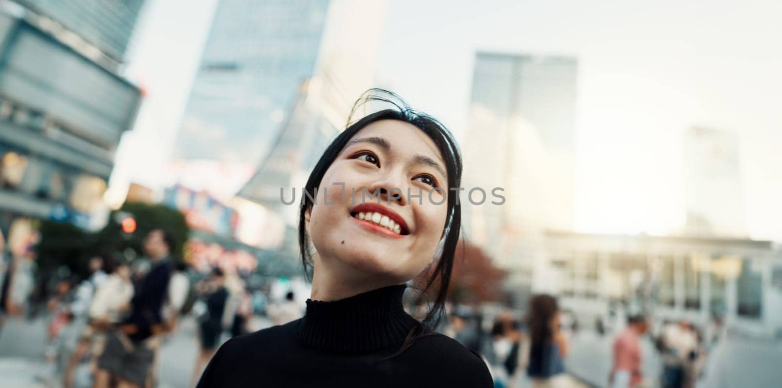 Japanese woman, city and happy with thinking, ideas and outdoor for vacation, travel or journey. Girl, person and smile on metro street, road or urban sidewalk for memory, vision or outdoor in Tokyo.