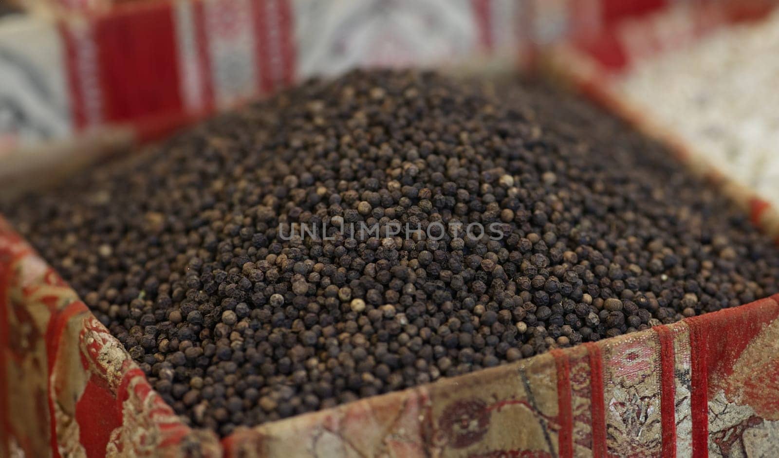 Close-up of bunch of black pepper, tiny round food ingredient, spice, seasoning, taste. Peppercorn, cooking ingredients, flavor, pepper grains concept