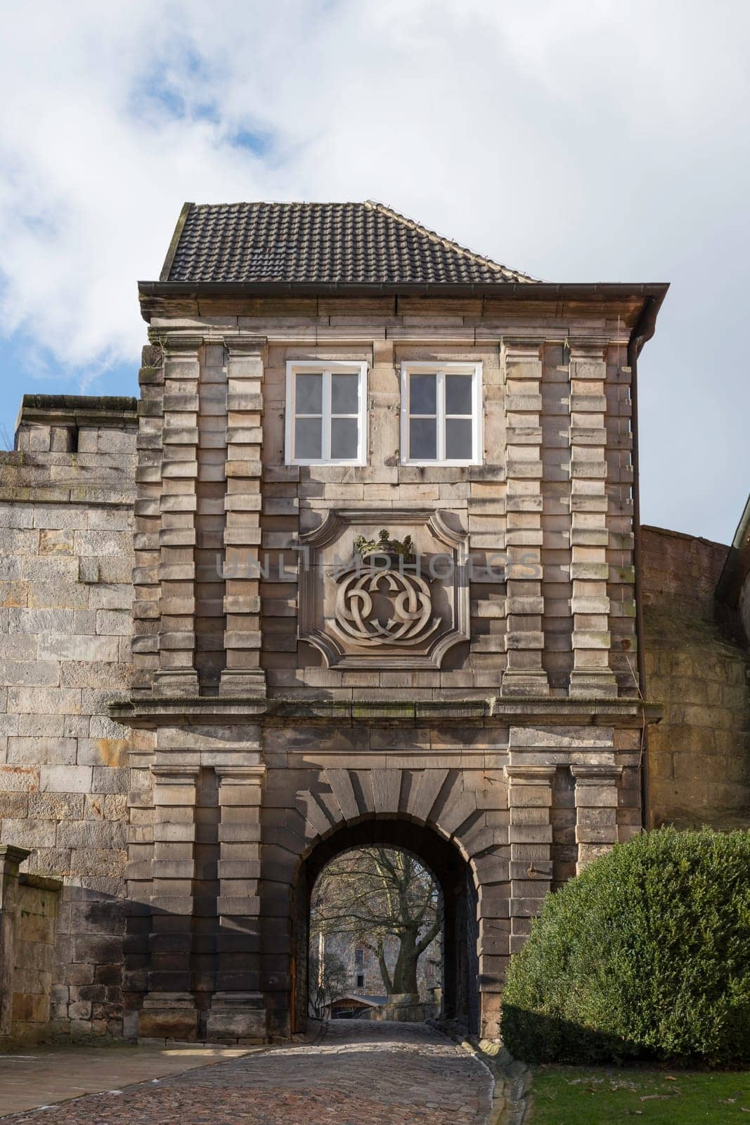 entrace bow of sandstone building in bad bentheim in germany by compuinfoto