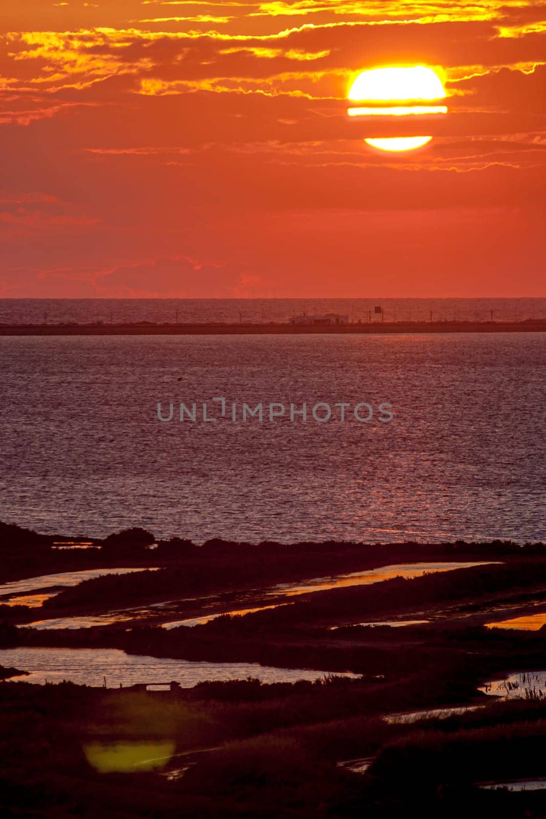 Fantastic sunset on the beach of Cortadura on Cadiz, Spain