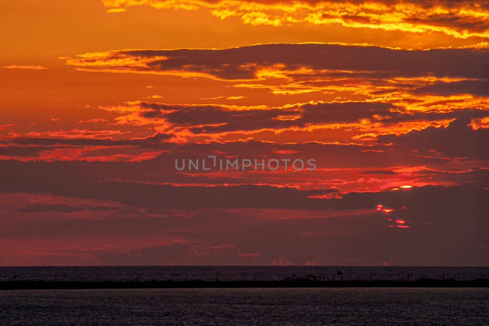 Fantastic sunset on the beach of Cortadura on Cadiz, Spain