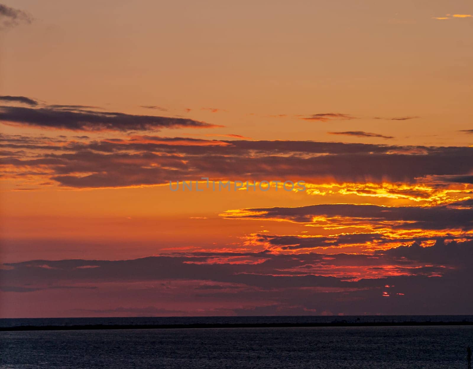 Fantastic sunset on the beach of Cortadura on Cadiz, Spain